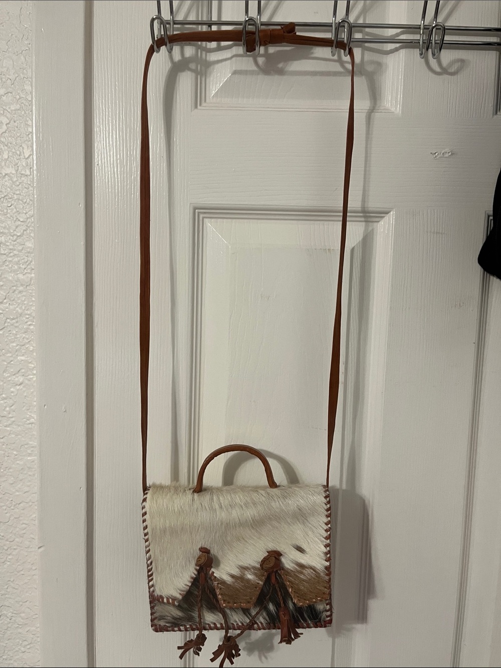 Brown and White Hair-On-Hide Crossbody Bag with Tassel Accents